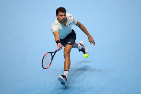 Tennis - ATP World Tour Finals - The O2 Arena, London, Britain - November 13, 2017 Bulgaria’s Grigor Dimitrov in action during his group stage match against Austria’s Dominic Thiem REUTERS/Hannah McKay
