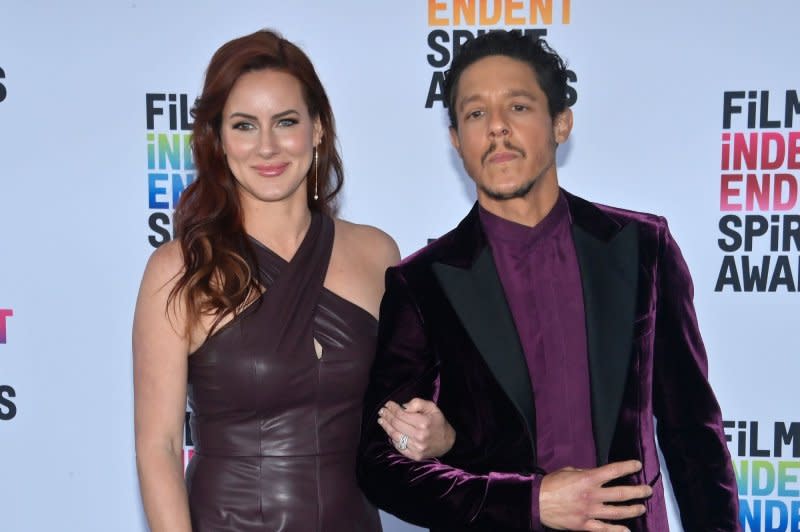 Meghan McDermott (L) and Theo Rossi attend the Film Independent Spirit Awards on Sunday. Photo by Chris Chew/UPI