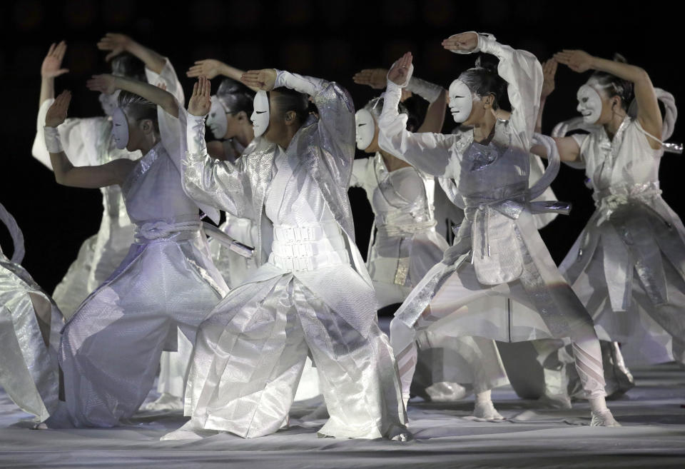 Dancers perform in the opening ceremony of the Rugby World Cup ahead of the Pool A game at Tokyo Stadium between Russia and Japan in Tokyo, Japan, Friday, Sept. 20, 2019. (AP Photo/Jae Hong)