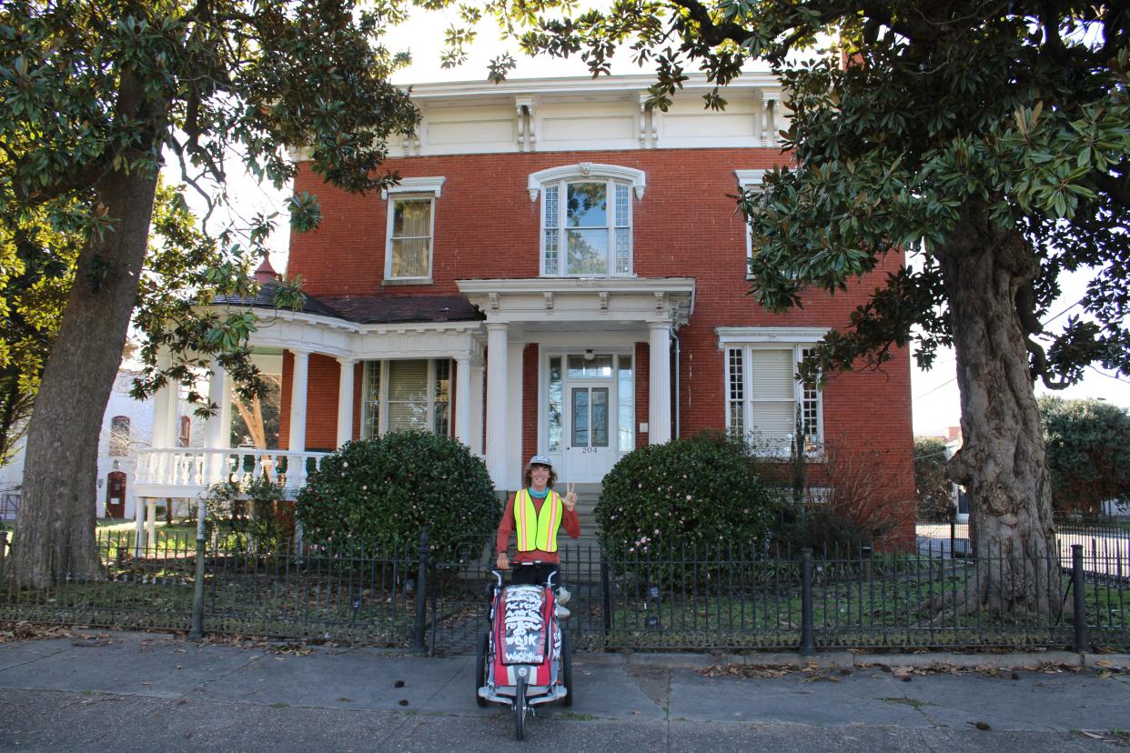 Holden Minor Ringer poses by historic Thomas Wallace House in Petersburg on February 29. President Lincoln met with Gen. Grant in this Italianate-style mansion built in 1855.