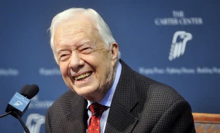FILE PHOTO - Former U.S. President Jimmy Carter takes questions from the media during a news conference at the Carter Center in Atlanta, Georgia August 20, 2015. REUTERS/John Amis/File Photo