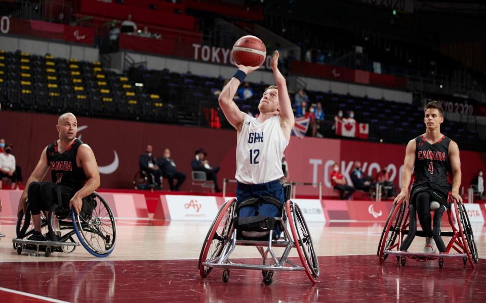 Gregg Warburton shoots for GB against Canada - PA