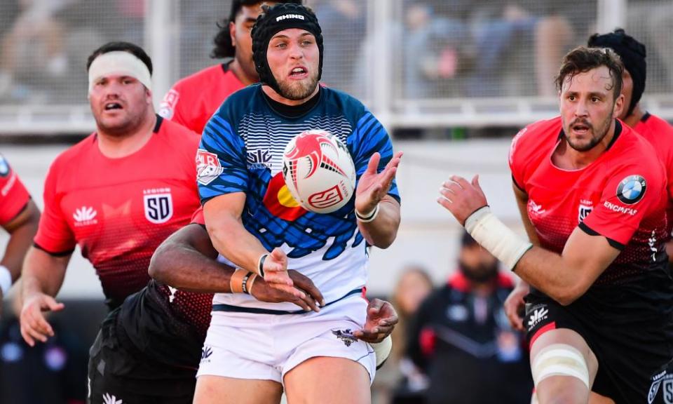 Chad Gough of the Colorado Raptors passes, watched by Paul Mullen (left) and Joshua Furno of the San Diego Legion.