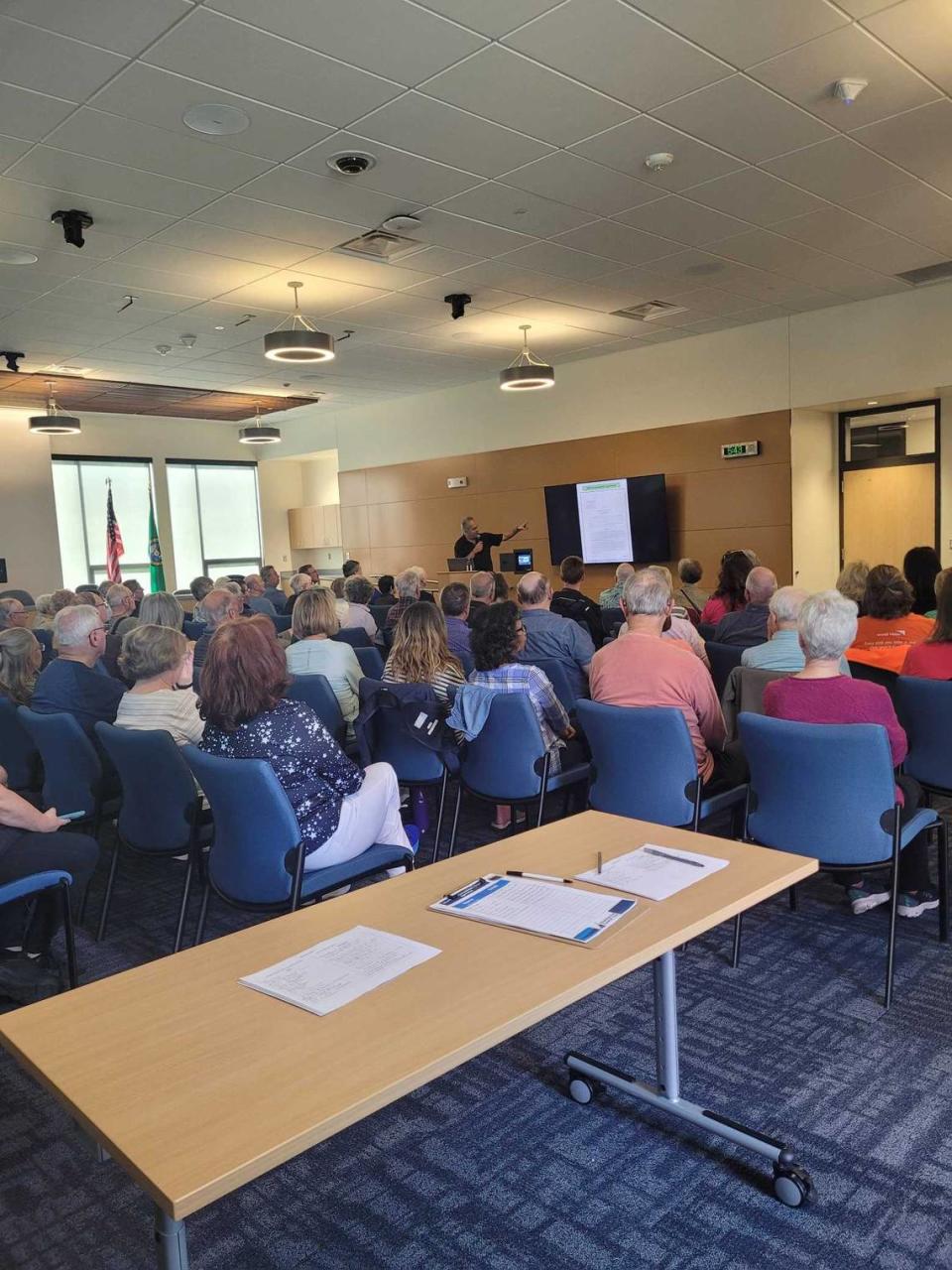 Jon Rose, the vice president of real estate for Raydient/Rayonier, talks to residents about the future and history of the Village at Harbor Hill project June 11, 2024 at Swift Water Elementary School in Gig Harbor. Alexis Krell