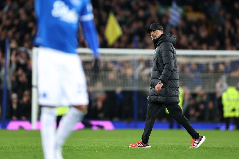 A dejected Jurgen Klopp walks off at full time after his teams 2-0 loss during the Premier League match between Everton FC and Liverpool FC at Goodison Park on April 24, 2024 -Credit:Photo by Robbie Jay Barratt - AMA/Getty Images