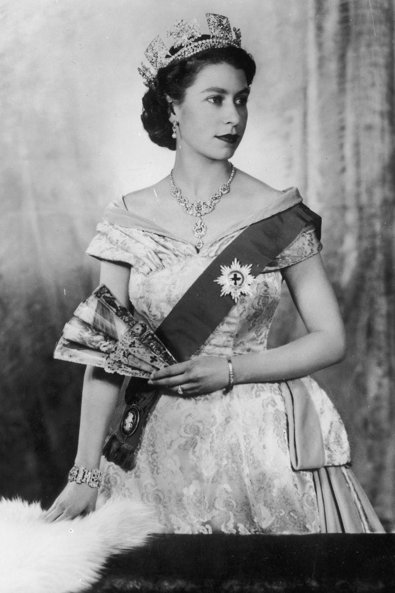 <p> Zooming out a little bit, this is a lovely story—Prince Philip's mother had a tiara converted into Queen Elizabeth's wedding ring, and the rest turned into a pretty geometric bracelet. The Queen wore both (here, on her right arm) often. </p>