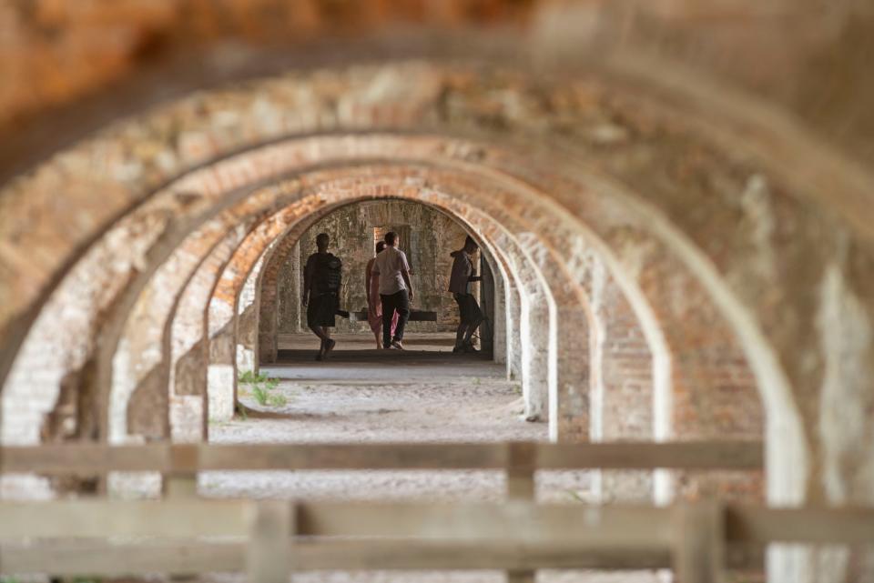 Visitors enjoy the sunshine and warm weather at Fort Pickens Sunday, May 17, 2020.