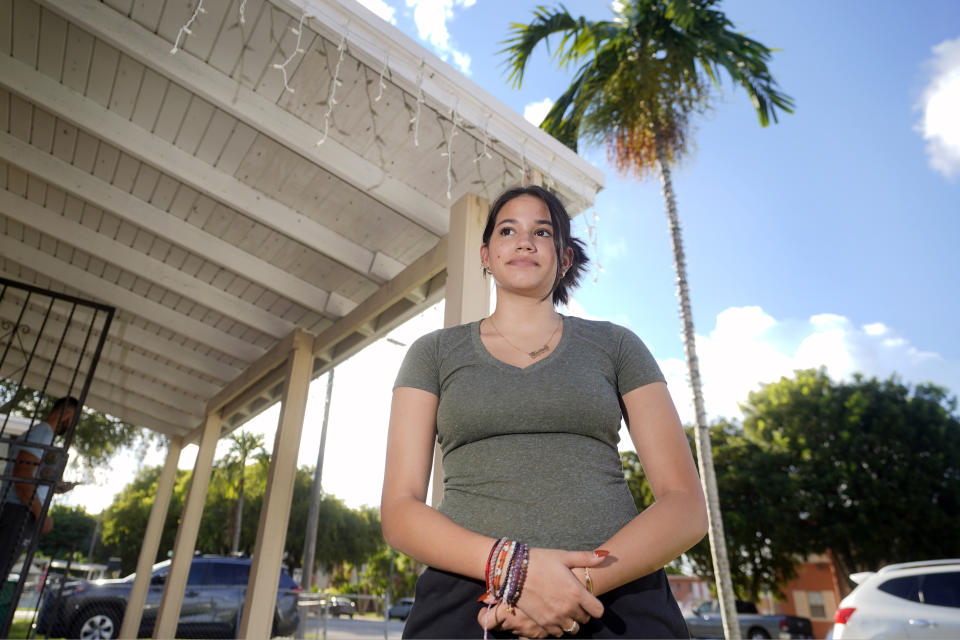 Adismarys Abreu, 16, poses for a photo at her home, Tuesday, Aug. 23, 2022, in Miami. Abreu had been discussing a long-lasting birth control implant with her mother for about a year as a potential solution to increasing menstrual pain. Then Roe v. Wade was overturned, and Abreu joined the throng of teens rushing to their doctors as states began to ban or severely limit abortion. (AP Photo/Wilfredo Lee)