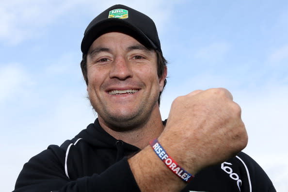 NRL legend Nathan Hindmarsh wears a 'Rise for Alex' wristband.