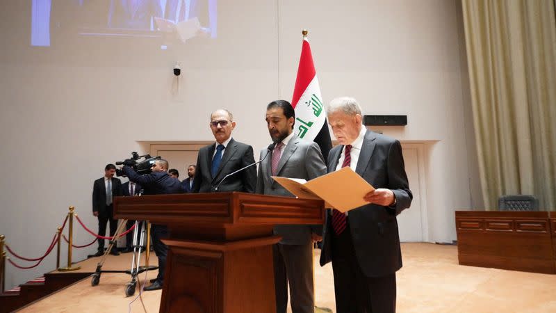 Abdul Latif Rashid takes his oath of office in front of Iraqi lawmakers in Baghdad