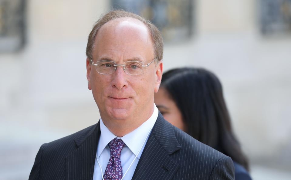 Chairman and CEO of BlackRock, Larry Fink (L) leaves a meeting about climate action investments with heads of sovereign wealth funds and French President at the Elysee Palace in Paris on July 10, 2019. (Photo by Ludovic MARIN / AFP)        (Photo credit should read LUDOVIC MARIN/AFP via Getty Images)