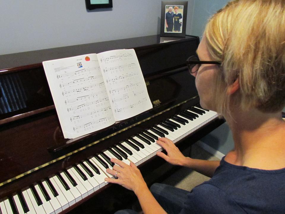 Jody Becker playing "Hey Jude" on the piano on June 23, 2023.