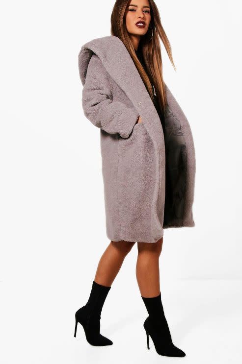 This mid-length lavender teddy coat has front snap closures, side pockets and an oversized hood. <strong><a href="https://fave.co/2UQ9Arh" target="_blank" rel="noopener noreferrer">Find it for $40 at Boohoo</a></strong>.