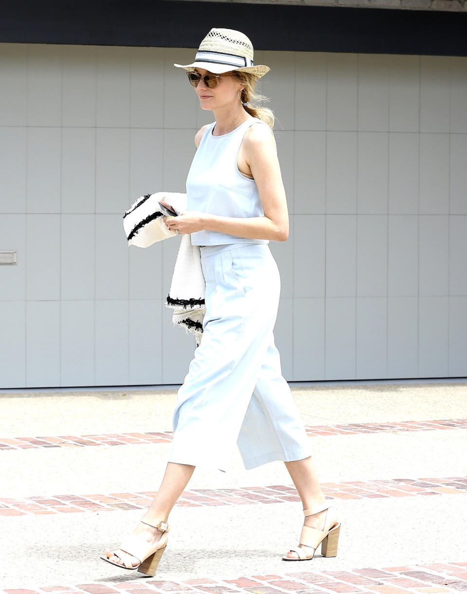 Diane Kruger in an all-white culottes look.