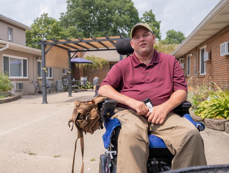 Travis Shinneman sits in the Ambassador Healthcare courtyard Thursday, July 29, 2021, in Centerville. Shinneman went into a Marion County Sheriff's vehicle non-disabled and left a quadriplegic, according to his lawyers.