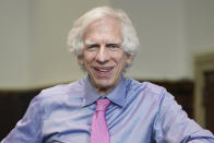 Judge Arthur Engoron poses for a picture in his courtroom in New York, Thursday, Sept. 28, 2023. Starting Monday, Oct. 2, Engoron will preside over a non-jury trial in Manhattan to resolve remaining claims in New York Attorney General Letitia James’ lawsuit against former President Donald Trump, his company and top executives. (AP Photo/Seth Wenig)