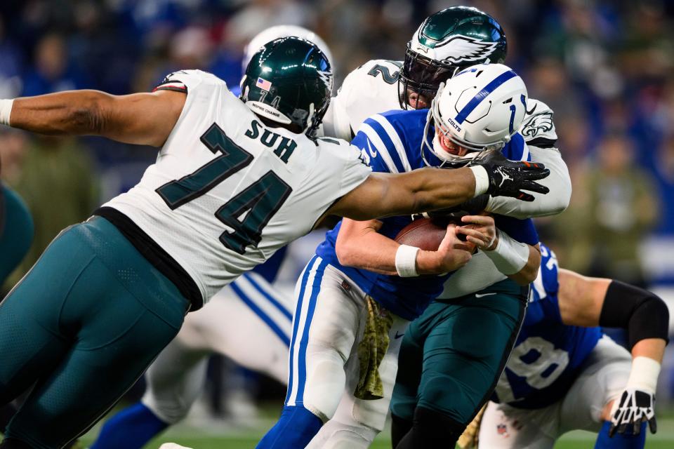 Philadelphia Eagles defensive tackle Linval Joseph (72) and Philadelphia Eagles defensive tackle Ndamukong Suh (74) sack Indianapolis Colts quarterback Matt Ryan (2) during an NFL football game, Sunday, Nov. 20, 2022, in Indianapolis.