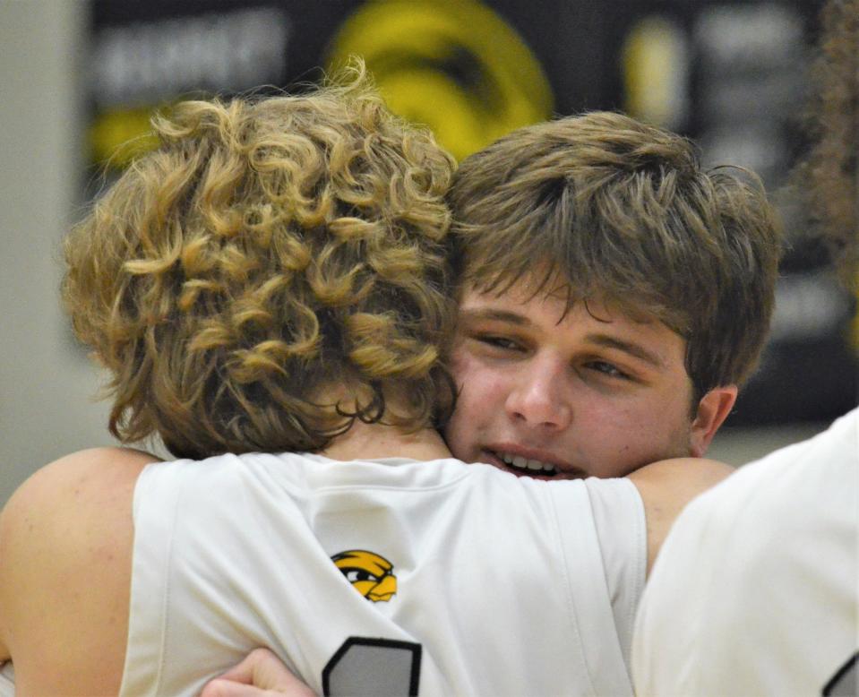 Hamilton's Austin Osborne celebrates winning districts on Friday at Hamilton.