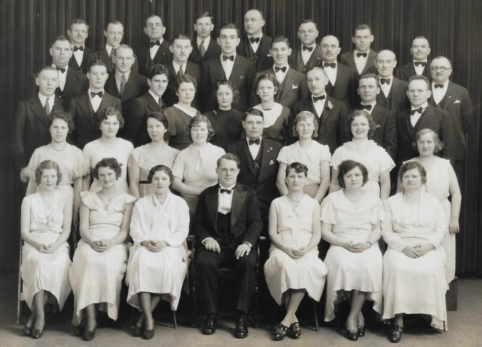 The Hungarian Home Singing Society, led by Karl Tamasi, takes a group portrait to promote a concert in February 1934 at the Magyar Home on East Thornton Street in Akron.