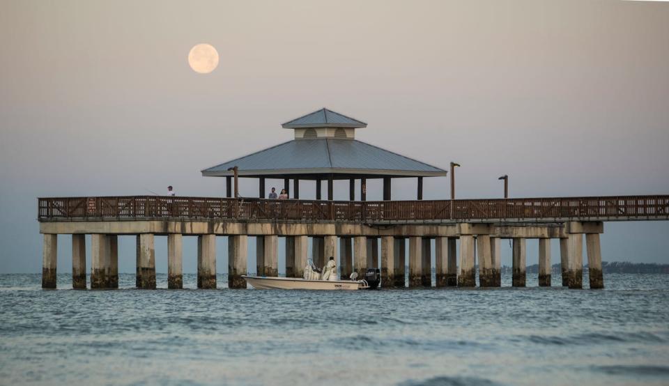 The Fort Myers Beach Fishing Pier at Lynn Hall Memorial Park, 950 Estero Blvd.., shown in this file photo, was destroyed by Hurricane Ian on Sept. 28, 2022. The Lee County Board of Commissioners approved bids to design the replacement pier and work at the park on Tuesday, April 16, 2024.