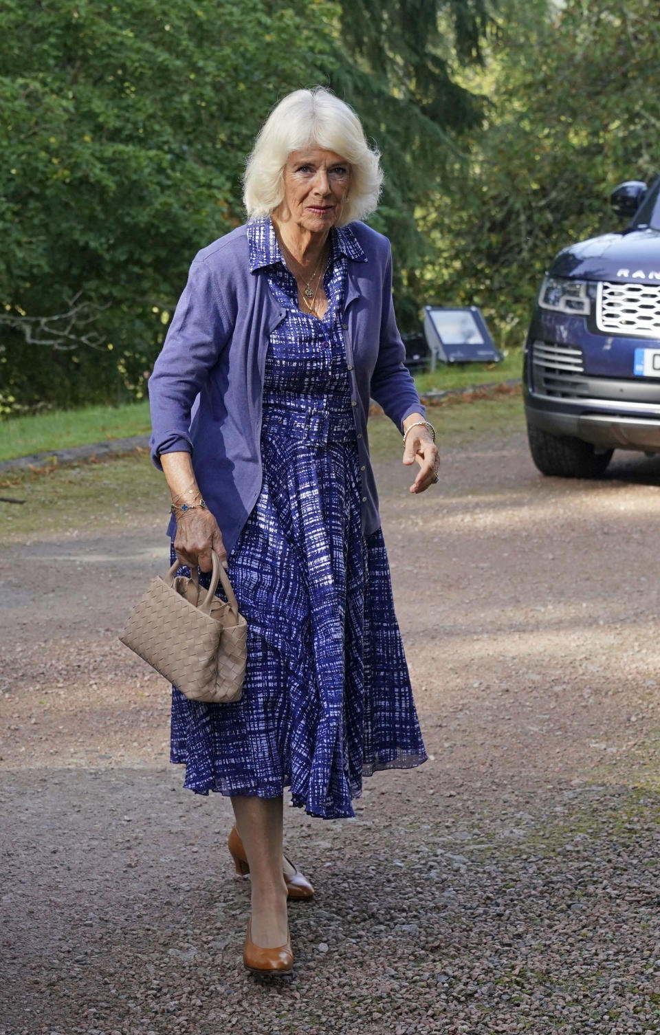 Britain's Queen Camilla arrives at Crathie Parish Church for a church service to mark the first anniversary of the death of Queen Elizabeth II, near Balmoral, Scotland, Friday, Sept. 8, 2023. (Andrew Milligan/Pool Photo via AP)