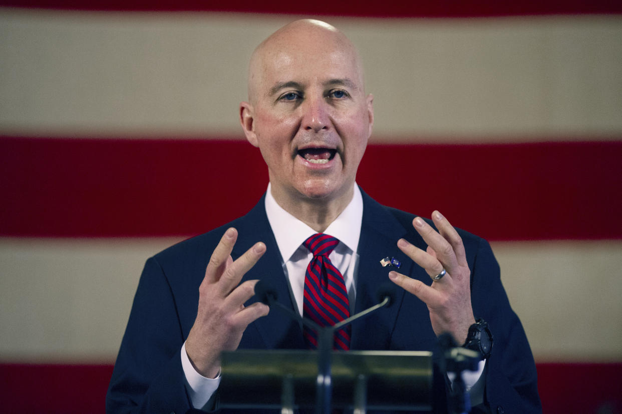 FILE - In this Feb. 26, 2021, file photo, Nebraska Gov. Pete Ricketts speaks during a news conference at the Nebraska State Capitol in Lincoln, Neb. Ricketts will unveil a state budget proposal on much like the other frugal spending plans he has introduced over the years, but this time he’ll have an extra $1 billion in extra cash from the federal government and plenty of people who want a cut. (Kenneth Ferriera/Lincoln Journal Star via AP File)