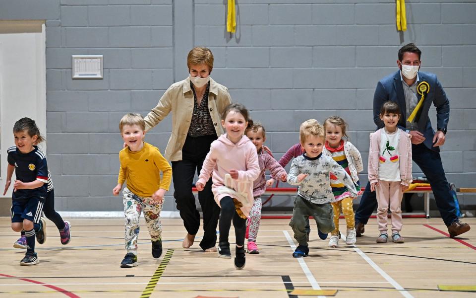 Run for the hills: Nicola Sturgeon campaigns with local candidate Fergus Mutch at the Benachie Leisure Centre - Getty