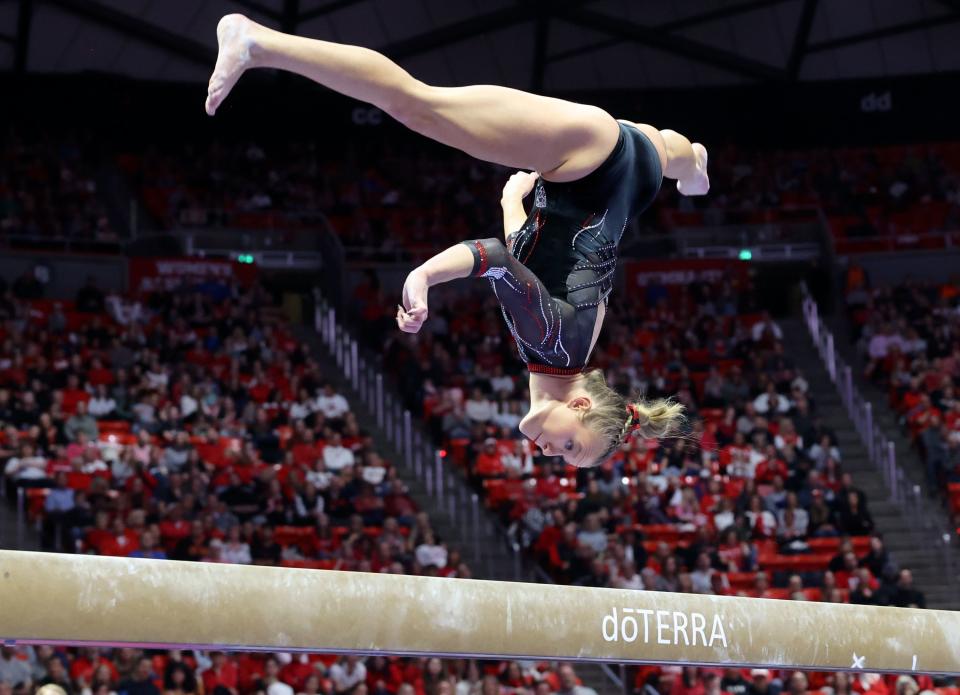 Utah’s Abby Paulson does her beam routine as the Utah Red Rocks compete against Oregon State in a gymnastics meet at the Huntsman Center in Salt Lake City on Friday, Feb. 2, 2024. Utah won. | Kristin Murphy, Deseret News