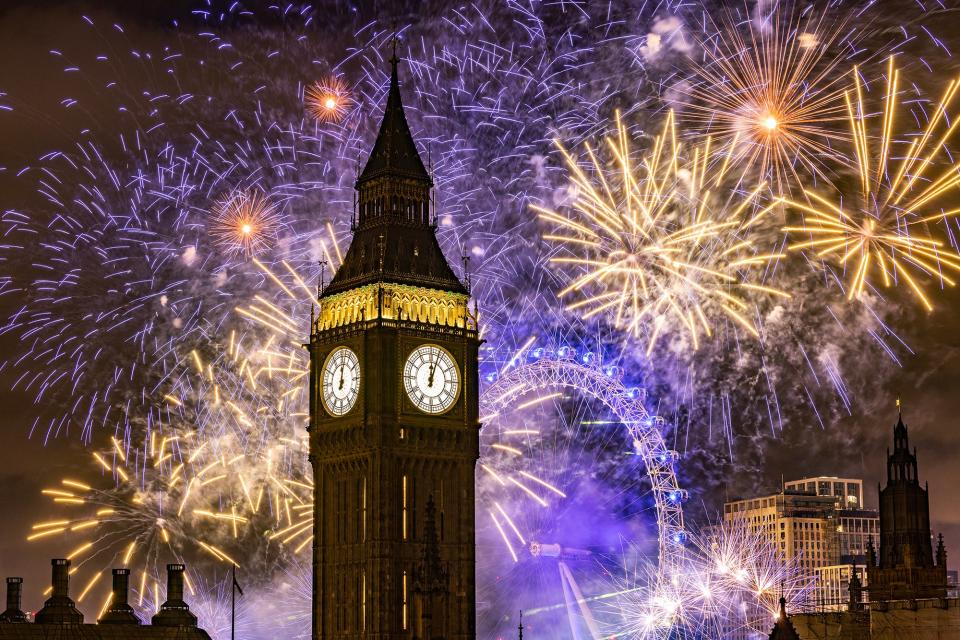 January 1, 2023 : Fireworks light up the London skyline over Big Ben and the London Eye just after midnight in London, England. London's New Years' Eve firework display returned this year after it was cancelled during the COVID Pandemic. 
