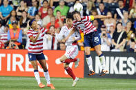 Sydney Leroux #11 and Abby Wambach #20 of the U.S. battle to head the ball against Wang Dongni #5 of China at PPL Park on May 27, 2012, in Chester, Penn. The U.S. won 4-1. (Photo by Drew Hallowell/Getty Images)