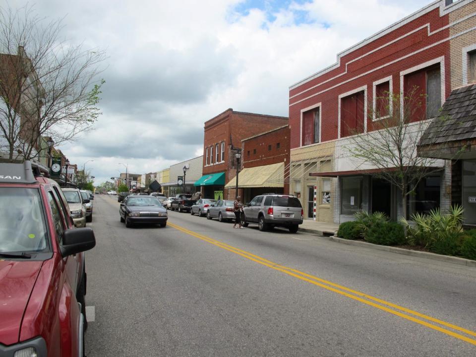 Downtown Lake City, S.C., is seen in this photograph taken on Thursday, April 18, 2013. The old tobacco town is hosting ArtFields, a 10-day arts festival running from April 19 through April 28, 2013. Artists from 11 southeastern states are represented in the 400 works on display throughout the community that is home to financier Darla Moore. Many of the works are being displayed in businesses in town. (AP Photo/Bruce Smith)