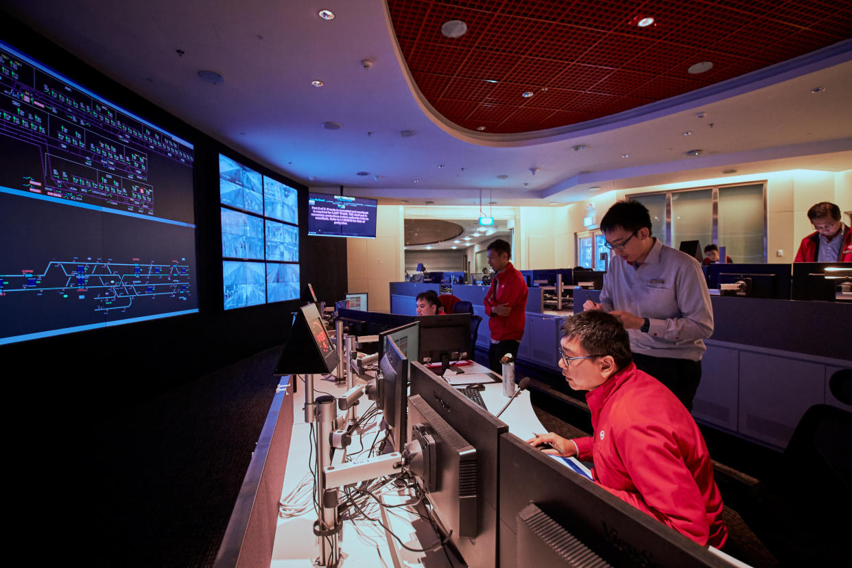 Staff members at the new SMRT Rail Operations Centre at Kim Chuan Depot. The centre houses both the Operation Control Centres for the Circle Line and the North-South/East-West Lines. (PHOTO: SMRT)