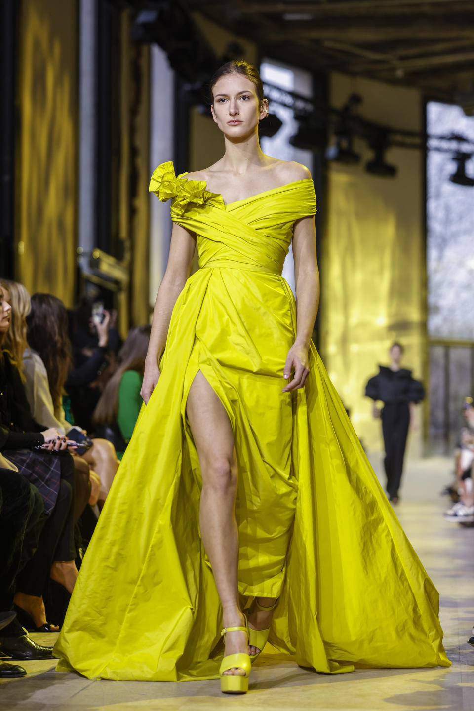 A model wears a creation as part of the Elie Saab Fall/Winter 2023-2024 ready-to-wear collection presented Saturday, March 4, 2023 in Paris. (Vianney Le Caer/Invision/AP)