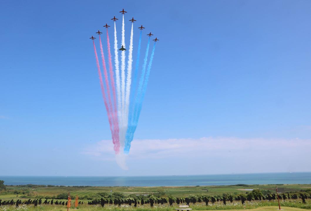 The Red Arrows flying over Normandy. (PA)