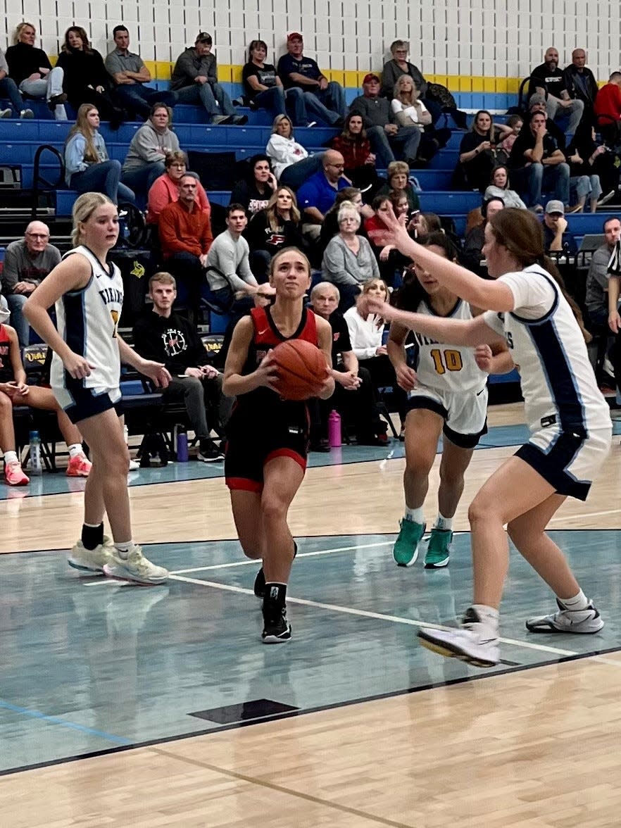 Pleasant's Emerson Williams drives to the basket during Friday night's Mid Ohio Athletic Conference girls basketball game at River Valley.