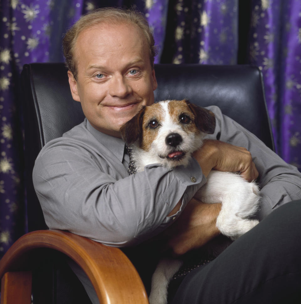 FRASIER -- Season 6 -- Pictured: (l-r) Moose as Eddie, Kelsey Grammer as Frasier Crane  (Photo by Bill Reitzel/NBCU Photo Bank/NBCUniversal via Getty Images via Getty Images)