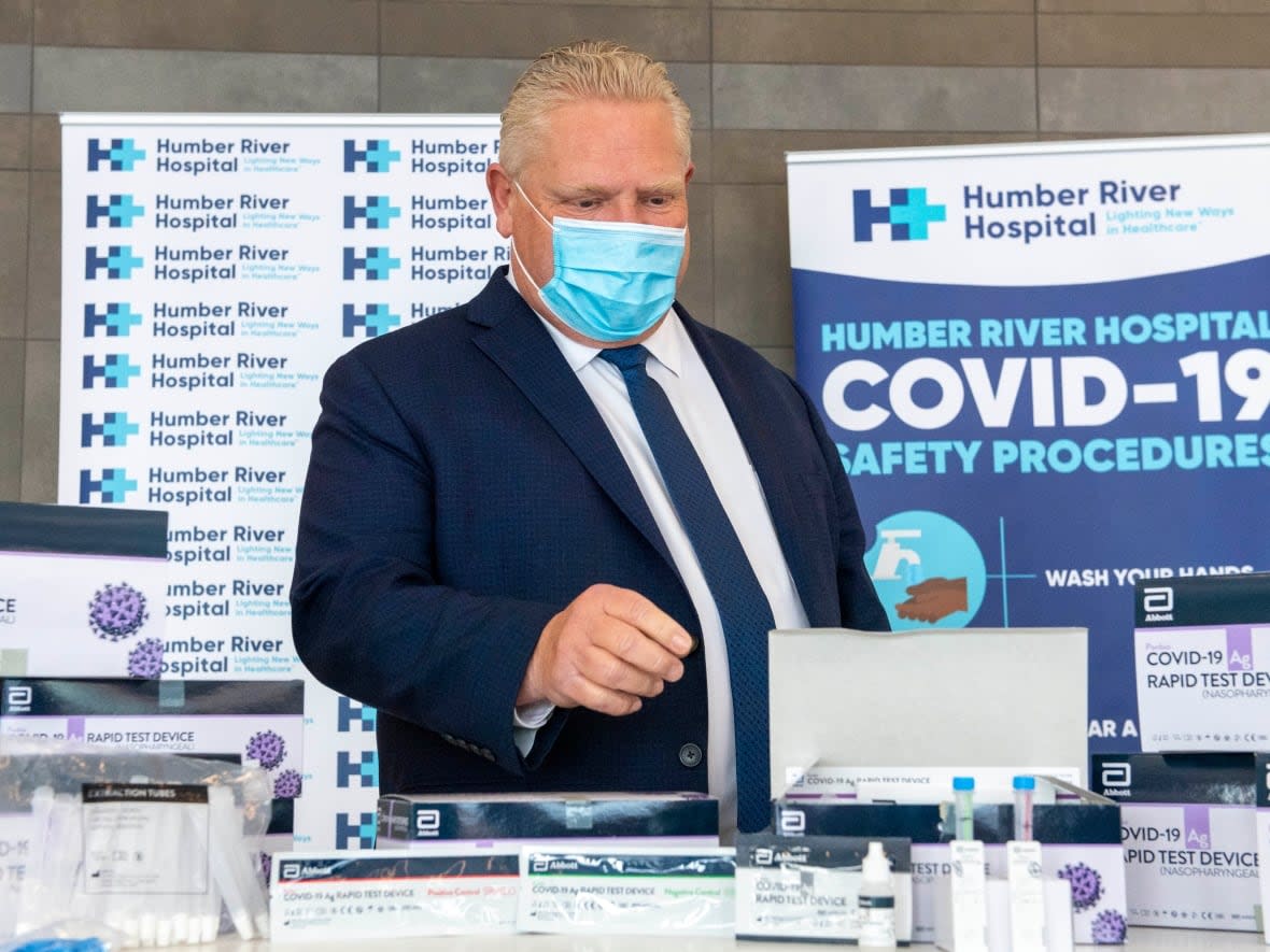 Senior officials in Premier Doug Ford's government have told CBC News that Ontario's program for paid sick days related to COVID-19 will be extended to July 31, 2022. The program was due to expire at the end of this month.  (Frank Gunn/The Canadian Press - image credit)