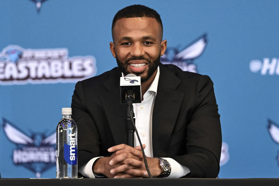 Charlotte Hornets new executive vice president of basketball operations Jeff Peterson smiles during an NBA basketball press conference, Wednesday, March 6, 2024, in Charlotte, N.C. (AP Photo/Matt Kelley)