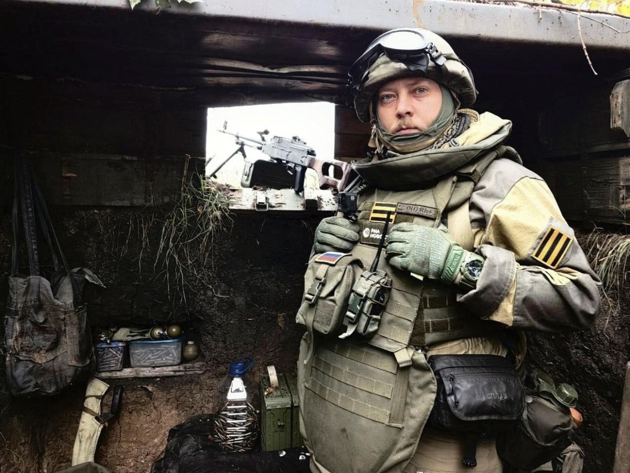 RIA correspondent Rostislav Zhuravlev poses for a picture at an unknown location (via REUTERS)