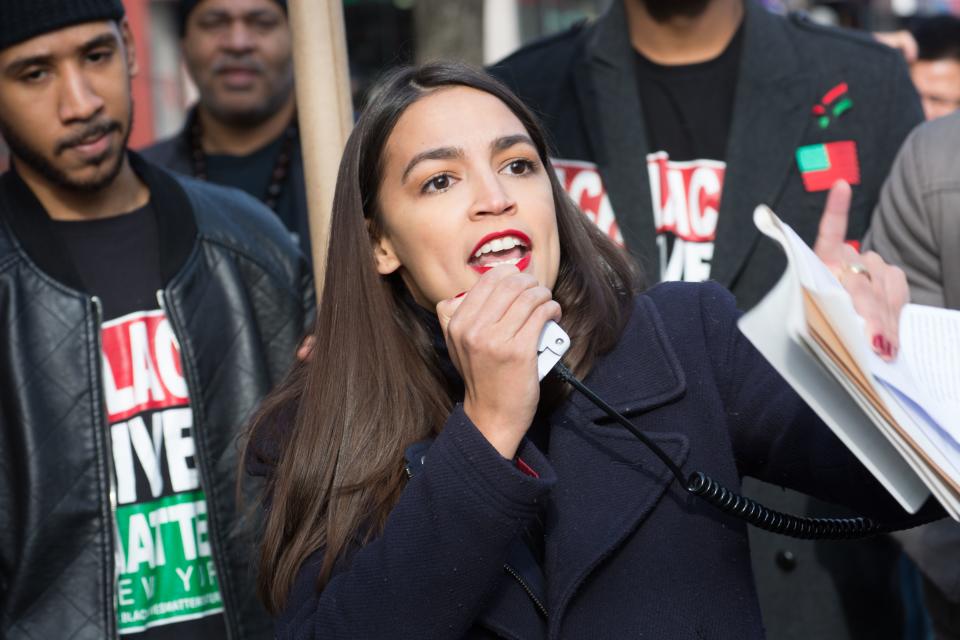 <span class="s1">Alexandria Ocasio-Cortez, who is running for Congress in New York, at a rally in December 2017. (Photo by M. Stan Reaves/REX/Shutterstock)</span>