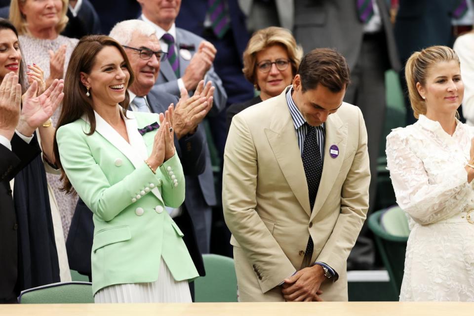 Former Wimbledon Champion Roger Federer interacts with Kate (Getty Images)