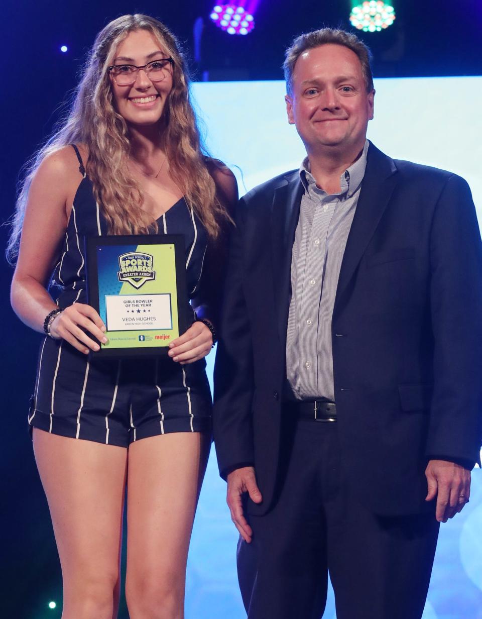Green High's Veda Hughes Greater Akron Girls Bowling Player of the year with Michael Shearer Akron Beacon Journal editor at the High School Sports All-Star Awards at the Civic Theatre in Akron on Friday.
