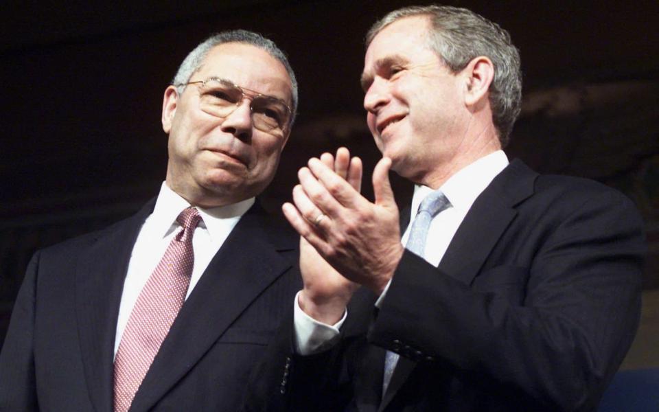 Colin Powell and George W Bush - PAUL BUCK / AFP