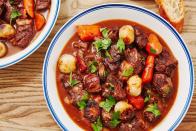 <p>If you do it right, homemade beef bourguignon is a labour of love. It's certainly not a quick <a href="https://www.delish.com/uk/cooking/recipes/g33964583/midweek-meals/" rel="nofollow noopener" target="_blank" data-ylk="slk:weeknight dinner;elm:context_link;itc:0;sec:content-canvas" class="link ">weeknight dinner</a>. BUT, that doesn't mean it's hard. Here's the basic rundown: Sauté <a href="https://www.delish.com/uk/cooking/recipes/g36926181/bacon-recipes/" rel="nofollow noopener" target="_blank" data-ylk="slk:bacon;elm:context_link;itc:0;sec:content-canvas" class="link ">bacon</a>, sear beef in bacon fat (yum!), add veggies and stir to coat with flour, add wine and stock, transfer to oven, bake until beef is super tender.</p><p>Get the <a href="https://www.delish.com/uk/cooking/recipes/a34569497/beef-bourguignon-recipe/" rel="nofollow noopener" target="_blank" data-ylk="slk:Beef Bourguignon;elm:context_link;itc:0;sec:content-canvas" class="link ">Beef Bourguignon</a> recipe.</p>