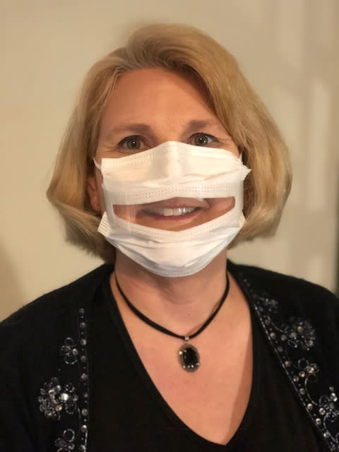 Image: Dr. Anne McIntosh, President of Safe'N'Clear, Inc., wearing a communicator mask. (Courtesy of Safe'N'Clear)