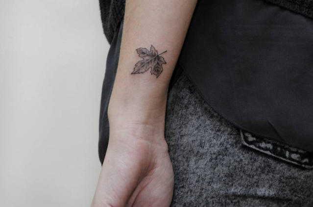 realistic maple leaf tattoo