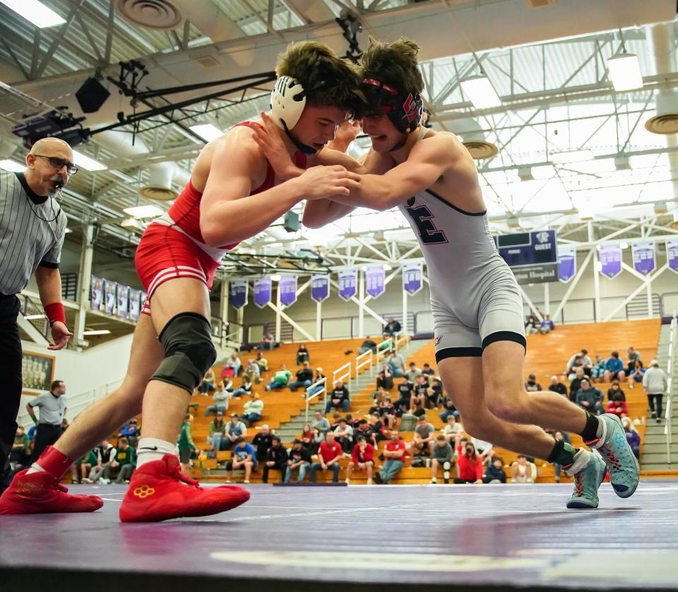 Edgewood’s John Orman (right) wrestles against Tell City’s Walter Hagedorn in the 120-pound final during the IHSAA wrestling regional at Bloomington South on Saturday, Feb. 3, 2024.