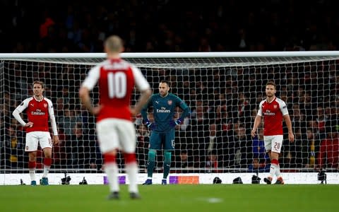 Arsenal players react - Credit: Reuters