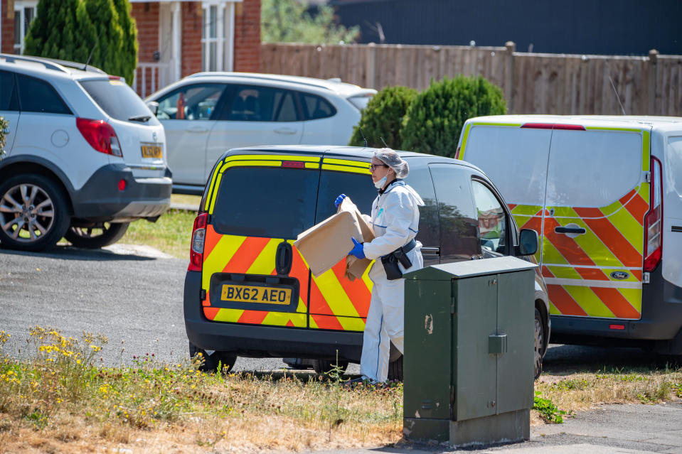 Police at the scene of the assault in Tipton, West Midlands.  May 28, 2020.  A woman is fighting for her life and a baby girl has suffered life threatening injuries following reports of an assault at a house. See SWNS story SWMDassault.  Emergency services rushed to the scene on The Leasowes, in Tipton, West Mids., after being called at around 12.30am today (Thurs).  The female victim was treated at the scene before taken to hospital in a critical condition.  The tot was also rushed to hospital for further treatment after suffering "potentially life-threatening injuries". 