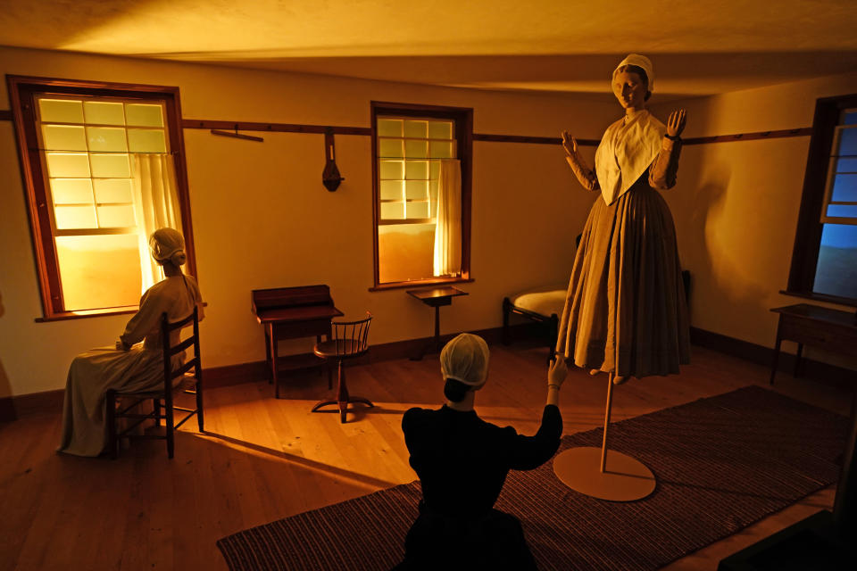 A scene staged by film director Chloe Zhao featuring fashions by designer Claire McCardell is displayed as part of the Met Museum Costume Institute's exhibit "In America: A Lexicon of Fashion," Saturday, April 30, 2022, in New York. (Photo by Charles Sykes/Invision/AP)